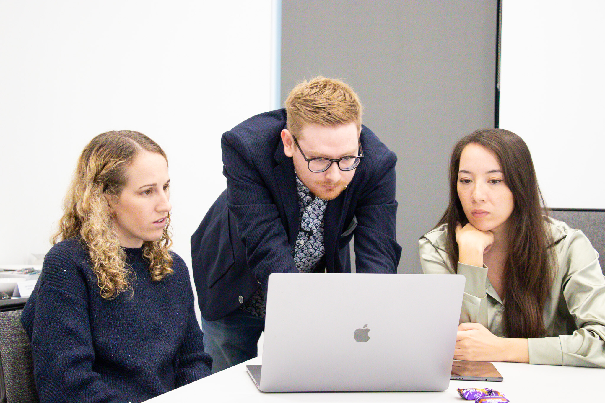 Tom Wardman, pictured working with a marketing team