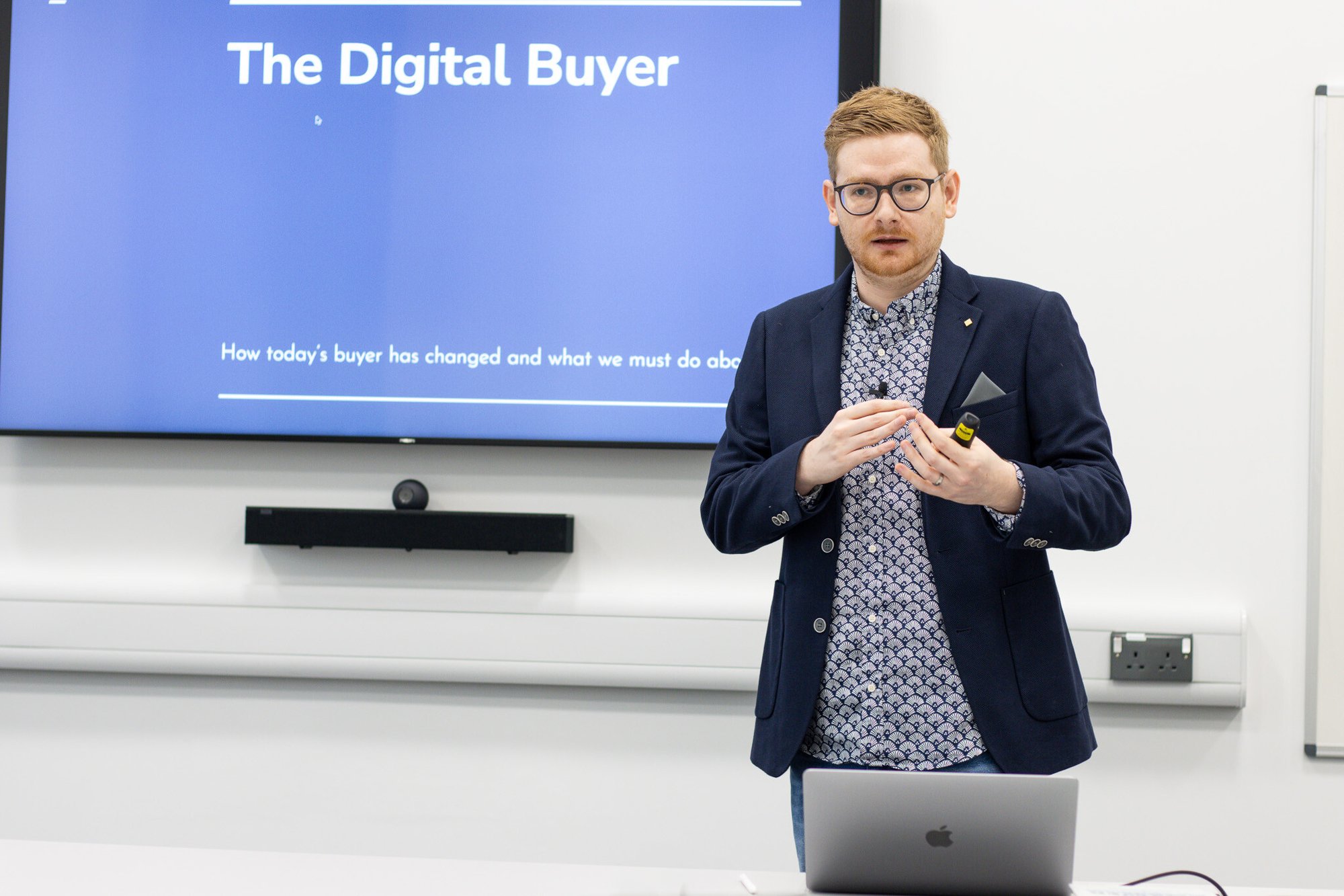 Tom Wardman, pictured delivering the talk "Navigating the Digital Buyer Landscape"